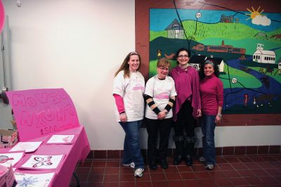 Movie Night
Rochester Memorial School Speech/ Language instructor Darbi Lambert-Matos along with her walking partner Jennifer DaCosta hosted a 'Movie Night' fundraiser at RMS on Friday evening January 20, benefitting the Susan G. Komen for the Cure Fund for the prevention and cure for breast cancer. The night's movie was the Disney feature ‘Snow Buddies’ with the event taking place in the school’s cafetorium. Photo by Robert Chiarito
