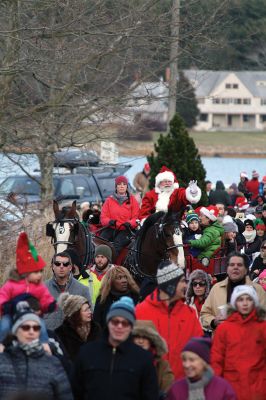 Marion Holiday Stroll 
Here Comes Santa Claus! – Santa made his big entrance to the Marion Holiday Stroll on Sunday, December 8, from across Sippican Harbor on his ‘water sleigh’ to the crowd that awaited him at the Town Wharf. The holiday stroll is the perfect way to get into the holiday spirit and capture a bit of that Christmas magic. Photo by Jean Perry
