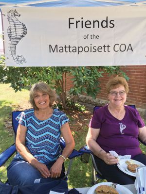 Mattapoisett Council on Aging
Administrative coordinator Jessica Fraine and Mattapoisett resident and Council on Aging volunteer Paula Coffey take a quick break from food service, as many staff and volunteers helped the Mattapoisett COA celebrate its 50th anniversary on Saturday outside Center School. Photos by Marilou Newell and Mick Colageo
