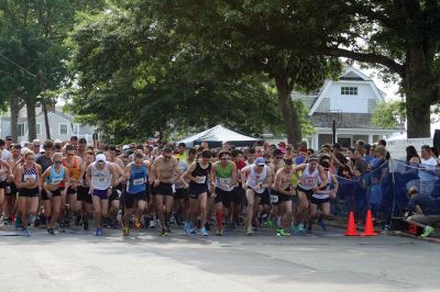 48th Annual Mattapoisett Road Race 
The 48th Annual Mattapoisett Road Race once again brought out young and old alike. Overcast skies were welcomed but the July 4th heat was tough for the runners and the cheering crowds who begged for shade. The field of runners was well over 1,000 and coming in first was Joe Farrand at 26:59. Shortly after, the first female to finish was Kim Bolick at 29:54. Before the starting gun sounded there was a moment of silence in honor of Maurice “Mudgie” Tavares who established the Mattapoisett Track Club, and the 
