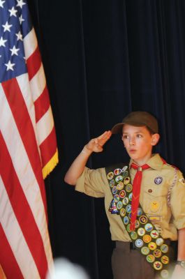Marion Annual Town Meeting
The Marion Boy Scouts and Cub Scouts kicked off Town Meeting season by presenting the flag and leading the pledge of allegiance at this years Marion Annual Town Meeting. Boy Scout Jack Gordon is seen saluting the flag during the pledge of allegiance. Photo by Felix Perez
