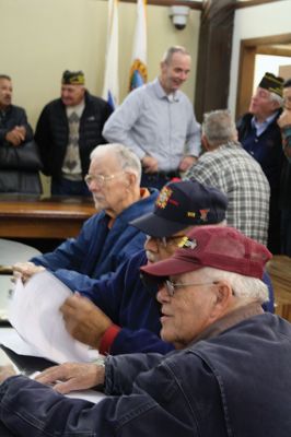 Benjamin D. Cushing VFW Post 2425
Members of the Benjamin D. Cushing VFW Post 2425 were present on Wednesday, December 7, for the signing over of the 465 Mill Street VFW building, marking the official transfer of the building to the Town. Selectmen thanked the gentlemen for their years of service within the town before Post Commander Demi Barros and Rodney Hunt signed the deed. Photo by Jean Perry

