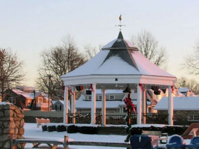 Holiday Star
Mary Ryan took this picture early one morning last year. The wind had blown the snow into the shape of a star on the bandshell in Shipyard Park.
Keywords: Happenings