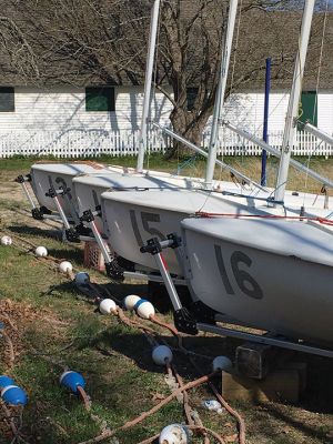 Sailboats for the Mattapoisett Sail program are lined up and ready as the 2021 season begins. Photo by Marilou Newell
