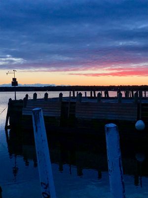 Mattapoisett Sunset
Mary Dermody took this photo of the sun setting beyond Mello Wharf in Mattapoisett recently while walking at the Town Wharves.

