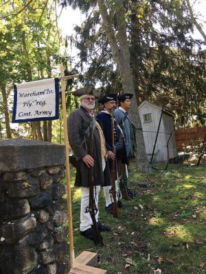 Rochester Historical Society
Militiamen Malcolm Phinney, Gary Franklin, and Jay Franklin performed an honor salute on October 2 at Woodside Cemetery as part of the Rochester Historical Society’s fall event debuting their Treasures of the Museum exhibit. Sixteen graves of soldiers have been found in the cemetery thus far from the Revolution, Civil War, and the War of 1812. Photos by Marilou Newell
