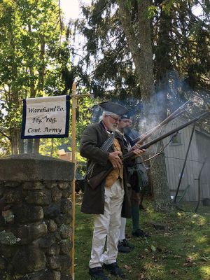 Rochester Historical Society
Militiamen Malcolm Phinney, Gary Franklin, and Jay Franklin performed an honor salute on October 2 at Woodside Cemetery as part of the Rochester Historical Society’s fall event debuting their Treasures of the Museum exhibit. Sixteen graves of soldiers have been found in the cemetery thus far from the Revolution, Civil War, and the War of 1812. Photos by Marilou Newell
