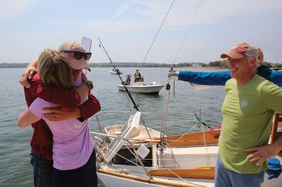 Cooper Newton 
Cooper Newton received an emotional welcome home from his parents Peter and Marley Newton, his girlfriend Autumn Horsey and a host of extended family and friends. The Mattapoisett native sailed his 27-foot boat Why Worry on a solo journey that took him as far as Turks and Caicos south of the Bahamas. His adventures included a surprise passenger in a raccoon that found his boat during a coastal storm. Photos by Mick Colageo and Cooper Newton
