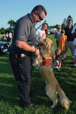 2nd annual Tri-Town Night Out
Tri-Town area police departments hosted their 2nd annual Tri-Town Night Out on August 5 at the ORR High School grounds. The meet and greet-style event was geared toward families, with live demonstrations and a chance to meet local law enforcement officials like Bella, a member of the Plymouth County Sherriff’s Department K-9 Unit. Photos by Jean Perry 
