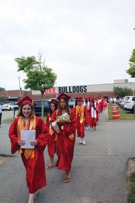 Old Rochester Regional High School Class of 2025
Old Rochester Regional High School Valedictorian Caitlin O’Donnell and Class of 2025 president Emerson Gonet lead the closing march of Saturday’s Commencement out to the football stadium for the ceremonial tossing of the caps. Gonet made an executive decision, according to ORR Principal Mike Devoll, who announced the change of plans at the close of graduation exercises in the gymnasium. Photo by Mick Colageo
