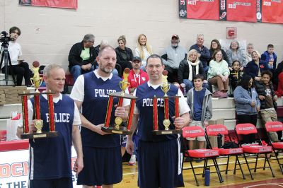 Old Rochester Regional Unified Basketball Team
The Old Rochester Regional Unified Basketball Team dominated Tri-Town Fire and Police to the delight of a packed ORR gymnasium on November 21. ORR seniors Traeh Carrington, John Butler and Jake Newton were recognized. Police chiefs Jason King (Mattapoisett), Robert Small (Rochester) and Richard Nighelli (Marion) presented $200 each from their respective departments to ORR’s Unified sports program, and nearly $2,700 was raised in ticket, T-shirt and concession sales. Photos by Mick Colageo
