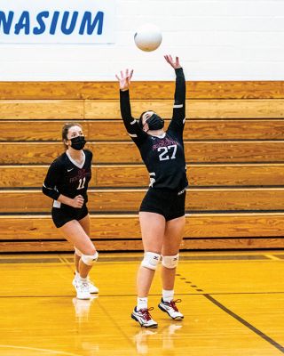 Old Rochester Regional High School Girls Volleyball
Senior co-captain Kailee Rodrigues sets the ball for her hitters, senior co-captain Meg Horan (11) and junior Maggie Brogioli (23), during the Old Rochester Regional High School girls volleyball team’s victory on Monday night at Fairhaven. The undefeated Bulldogs (11-0) open the South Coast Conference playoffs on Friday, April 30, on their home court in Mattapoisett. Photo by Ryan Feeney
