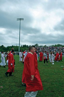 ORR Grads
Old Rochester Regional High School held commencement ceremonies for the Class of 2009 on Saturday, June 6 at David S. Hagen Memorial Field on the ORR campus. An overflow crowd of family, friends and faculty was on hand to look on as over 150  graduates received their diplomas. Photo by Robert Chiarito.
