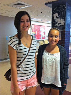 ORR Exchange Students
Elena Voigt (left) is one of four foreign exchange students joining ORRHS this year. She came from Germany to stay with the Clancy family in Rochester. Here she stands with her younger host sister, Alyssa Clancy (right), at the ORRHS new student orientation last Friday. Photo by Renae Reints.
