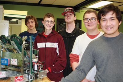 New England VEX Robotics Competition
Above: Old Colony students (left to right) John Barns, Tanner Stafford, Nickolaus Smith, Ben Jensen, Jasper Tan, and Jesse Goodwin (not pictured) entered their robot in the Southern New England VEX Robotics Competition on March 5 and 6 at Quinsigamond Community College in Worcester. Right: the team’s VEX robot. Photos by Marilou Newell
