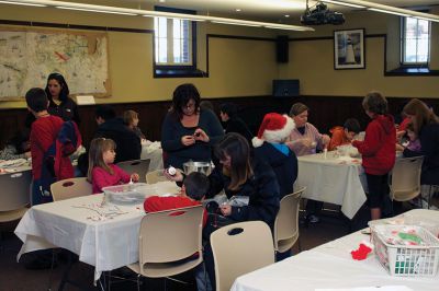 Holiday Ornaments
On Saturday, December 15, the Mattapoisett Library held a kids holiday ornament-making day.  The activity was organized by the Friends of the Library.  Families dropped in all afternoon to craft hand-made ornaments like reindeer made of cork.  Photo by Eric Tripoli.
