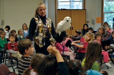 Eyes On Owls
Sippican Schools kindergarten classes welcomed Marcia Wilson from Eyes On Owls on November 19, 2010. Ms. Wilson, an owl expert, introduced a Northern Saw-Whet Owl, an Eastern Screech Owl, a Barred Owl, a Snowy Owl, a Great Horned Owl and an Eagle Owl to the eager young students. Photos courtesy of Sarah Goerges.
