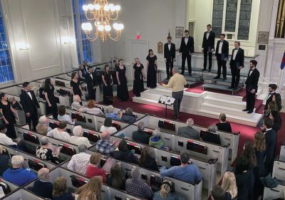 Patrick Henry College Chorale
Pastor Richard Woodward welcomes the Patrick Henry College Chorale to the First Congregational Church of Marion. The group performed under the direction of Rodney Appleton. Photos courtesy of Janet Reinhart
