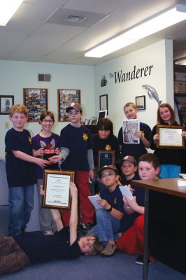Stop the Press!
Cub Scouts from Rochester Pack 30 visited The Wanderer office on April 11, 2011 to work on the April 14, 2011 issue as part of a Communication achievement they are working to earn. Pictured from left to right: back: Nolan LaRochelle, Ava DeMaggio, Harrison Riley, Dylan Musgrove, Jacob DeMaggio, Mackenzie Riley; front: John Roussell, Gabe McCollester, Ray Williams, Patrick Flannery. Photo by Chris Martin. April 14, 2011 edition
