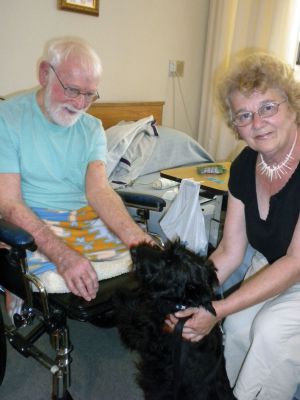 Pet Therapy
Bruce Miller, left, and Maryann Murphy, right pose with Abby, a Scottish Terrier and Therapy Dog.  Murphy brings Abby to the Sippican Health Center every Friday to visit patients.  Photo by Joan Hartnett-Barry. 
