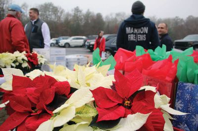 Pie & Poinsettia
In lieu of the annual senior luncheon, the Town of Marion collaborated with the Marion Fire Fighters Association, the Marion Police Brotherhood and Tabor Academy to hold a Pie & Poinsettia pickup on December 11 at the Cushing Community Center. Photos by Mick Colageo
