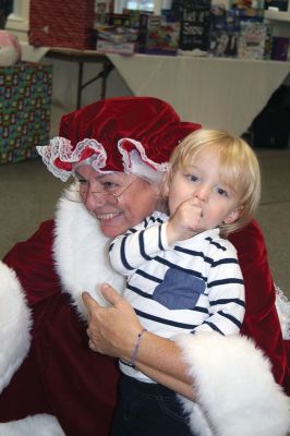 Santa and Mrs. Claus
Santa and Mrs. Claus made a stop at the Marion Police Brotherhood’s annual Pizza with Santa on Sunday, December 2, at the Benjamin D. Cushing Community Center. In addition to the jolly couple’s company, children and families enjoyed the pizza donated by Brewfish and even helped kick the Brotherhood’s Toy Drive into overdrive. Photos by Jean Perry

