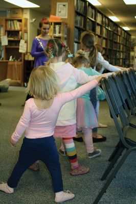 Plumb Ballet
Miss Bridget (Bridget Farias), a Junior Friend of the Plumb Library, hosted an introduction to ballet session on Friday morning, February 24. Little girls, some in ballet slippers, lined up in front of Miss Bridget to learn the four primary positions of ballet and read a story about ballerinas. Photos by Jean Perry
