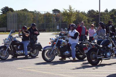 Poker Run
Motorcyclists gathered Sunday morning, September 20, in the parking lot of ORR to ride in the third annual Poker Run for Alex Pateakos. Alex is a five-year-old Marion boy who suffers from Spinal Muscular Atrophy. Money raised by the poker run will benefit Alex, and Families of SMA, a group that helps families like the Pateakos live their lives as close to normal as possible. The Poker Run covered 65 miles and ran through Lakeville, Carver, East Wareham, and back to ORR. Photo by Anne O'Brien-Kakley
