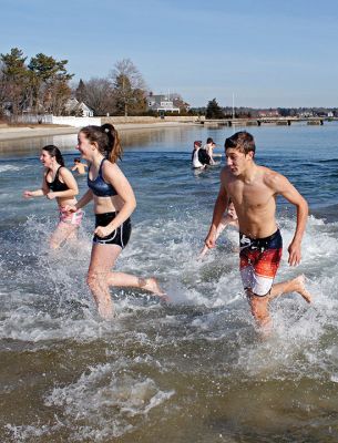 Tabor Academy Polar Plunge
Tabor Academy hosted its second annual Polar Plunge on Sunday, January 21 at Silvershell Beach to raise money for the school’s Special Olympics Young Athletes Program. Students from ‘fundraising rival’ Sandwich High also showed up, with scores of students and staff making a dash in and quickly out of the chilly waters. The plunge raised about $8,000. Photos by Deina Zartman
