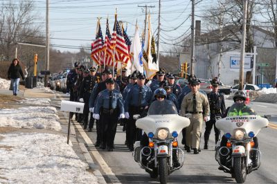 Service for Lt. Paul Silveira
The Police Department Honor Guard leads the procession From St. Anthony's Church to Cushing Cemetary during the service for Detective Lt. Paul Silveira on January 20, 2011. Lt. Silveira died at the age of 60 on January 14, 2011. Photo by Paul Lopes.
