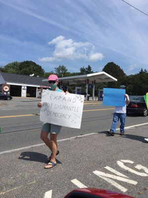 Save the Post Office
Members of the Mattapoisett Democratic committee were expressing their opinions at the corners of Route 6 and North Street on Saturday August 22nd. Photo by Marilou Newell
