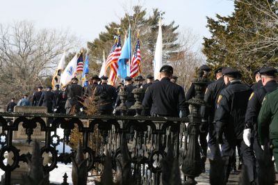 Service for Lt. Paul Silveira
Police officers from throughout the SouthCoast, including Mattapoisett, Marion, Rochester, Acushnet, New Bedford and Dartmouth, marched in procession to Cushing Cemetery for the funeral of Detective Lt. Paul Silveira on Thursday, January 20, 2011. Mr. Silveira, who had served on the Mattapoisett Police Department since 1984, died unexpectedly of a brain aneurysm on January 14, 2011. Photo by Laura.

