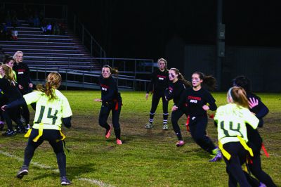 Powder Puff Football
ORR held its annual Powder Puff football game on Tuesday, November 20.    Girls from the junior and senior classes played full-field flag football under the lights in front of an excited crowd.  ORRHS Principal Mike Devoll (in shorts) and Athletic Director Bill Tilden acted as referees during the one-hour game.  Check out these photos from the game.  The juniors are in green and the seniors are in black.  Photos by Eric Tripoli. 
