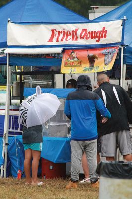 The Sun Will Come Out … Tomorrow 
Friday was a washout at the Rochester Country Fair, but the rain didn’t dampen the fun for those who braved the elements. Photos by Jean Perry
