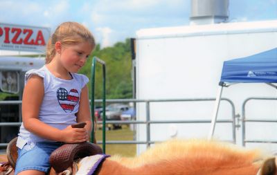 Farmers, Families, Fiddles 
Along with the sun on Saturday came the crowds to the Rochester Country Fair. Kid’s activities that were canceled on Friday resumed on Saturday under a blue sky. Photos by Jonathan Comey
