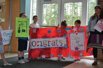 RMS Class of 2012
Rochester Memorial School welcomed back its RMS Class of 2012, with young students lining the halls to watch the big kids pass through one last time as students. Photos by Jean Perry

