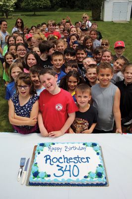 Rochester turned 340 
Hey, hey, it’s your birthday, Rochester! Rochester turned 340 years old on June 4, and the third grade class from RMS was invited to celebrate with some cake and ice cream at the senior center on Tuesday. Students started the day with a tour around historic Rochester before breaking for lunch and sharing a large birthday cake with seniors. Students also received a free “Rochester 340” t-shirt, courtesy of a grant that funded the students’ birthday gifts. Photos by Jean Perry
