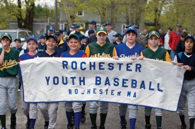 Rochester Youth Baseball 
Rochester Youth Baseball kicked off the 2011 season with a parade to Gifford Park and a flyover.  The Cubs defeated the Royals 11-4 and the Braves and Red Sox played to a score of 10-10 before the game was postponed. Photo by Felix Perez.
