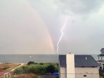Rainbow Lightning
Carol Mallegni took this photo on August 9 during a Mattapoisett storm that produced a rainbow and a lightning strike.
