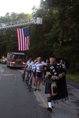 Firefighters Memorial 
Eight firefighters – four from Rochester – followed bagpiper Iain Massie to the Firefighters Memorial the morning of 8/24 to begin the inaugural four-day, 316-mile long Southern New England Brotherhood Ride, organized by Rochester Firefighter Andy Weigel. The ride was to remember 14 who lost their lives in the line of duty this past year. Photos by Jean Perry
