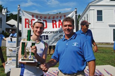 Rochester Road Race
Rochester Road Race winner Julien DiMaria of Lexington, MA proudly holds his trophy after his victory on August 14, 2010. Photo courtesy of Chuck Kantner. August 19, 2010 edition
