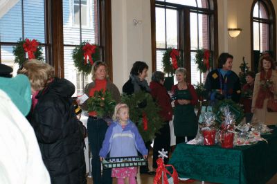 Marion Garden Club
The Marion Garden Club had their annual wreath and green sale while the Sippican Womans Club conducted their house tour, which made Marion village a very festive and fun place to be on December 12, 2009. There were mini-trees, ornaments, wreaths, evergreen ropes and boughs of every variety on sale in the Music Hall. Photo by Anne OBrien-Kakley
