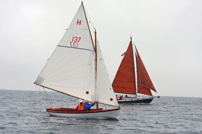 Builder's Cup
SWAN SONG, a Doughdish skippered by George Moffatt of Marion, and BUTTERFLY, a Stone Horse skippered by Vern Tisdale of Mattapoisett, and a photo of the crew aboard BUTTERFLY. Photo by Fran Grenon, www.spectrumphotofg.com
