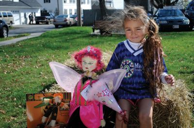 Scarecrow Fun
Jeannine Duchaine shows off her fairy princess scarecrow at the October 15, 2011 Mattapoisett library scarecrow contest. Jeannine's scarecrow won "Best Dressed" in the competition. Photo by Felix Perez.
