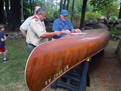 Classic Canoe
Marion resident Paul S. Kohout, donated his 16 foot, mahogany, 1959 Canadian Mounty Police Wooden Cargo Canoe to Marion Boy Scout Troop 32/Cub Scout Pack 32 on Thursday September 11, 2014. The Scouts are honored to have such an amazing vessel offered to them and plan to use it in future outings. Pictured are Paul S. Kohout, Scoutmaster Paul St. Don, Cubmaster Leo Grondin, as well as Scouts Jackson St.Don, Lee Grondin and Oakley Campbell.
