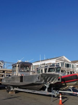 Seasons End
Nothing says summer is over more than seeing the Harbormaster’s boat hauled out of the water. Behind that vessel rests the Mattapoisett Fire Boat, also standing down for now. Both vessels are on trailers ready to deploy, if needed. Photo by Marilou Newell
Keywords: Happenings