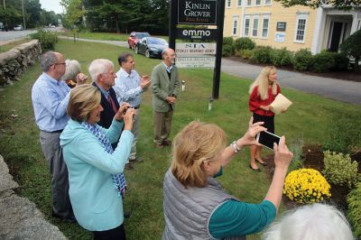 Welcome to Marion
Marion Garden Group member Elizabeth Hatch presents the town’s new sign on September 20 to a large gathering of residents at the Captain Hadley House property at the corner of Front Street and Route 6. The new sign was funded by the Town and is part of the garden group’s Marion beautification project. Photo by Jean Perry

