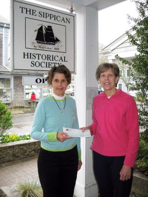 Fundraising Clean-up
Sippican Historical Society President Judith Rosbe is shown presenting a $500 donation check to event organizer Margie Baldwin. 

