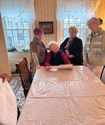 Sippican Woman’s Club
Sippican Woman’s Club members get ready to stage-set their clubhouse to welcome visitors to their 33rd Holiday House Tour on Saturday, December 9, and the following day’s Village Stroll when all of Marion sets out to enjoy the Holiday Season. From left, Pat OConnell, Jeanne Bruen (seated), Lorraine Charest  and Nanna Buckley. Photo courtesy Sippican Woman’s Club
