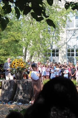 Children’s Memorial Garden
Where for many years stood a tall spruce tree at Sippican Elementary School is now a large stump at the center of a newly dedicated Children’s Memorial Garden honoring the lives of former students Marques Sylvia, Andrew Rego, Alexis Wisner and Cory Jackson. On June 14, Principal Marla Sirois led a celebration of the vision of former Principal Marylou Hobson (1990-2004) and the generosity and effort of Steve Gonsalves, Suzanna Davis, Margie Baldwin and the Pythagorean Lodge. Photos by Mick Colageo
